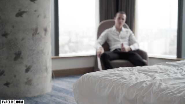 A guy jerks off a dick, looking at the sex of his beauty with another