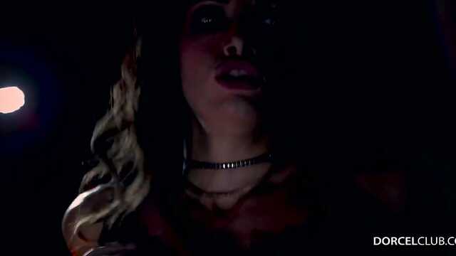 Under the light of lanterns gives a point to a crowd of men