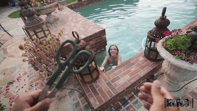 A redhead near the pool let a member of a pick-up truck into her pussy