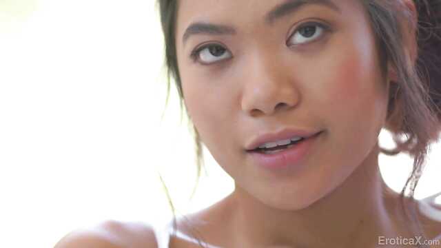 Gentle sex on the bed with a cute Asian