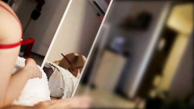 A young couple in their bedroom filming homemade porn on camera